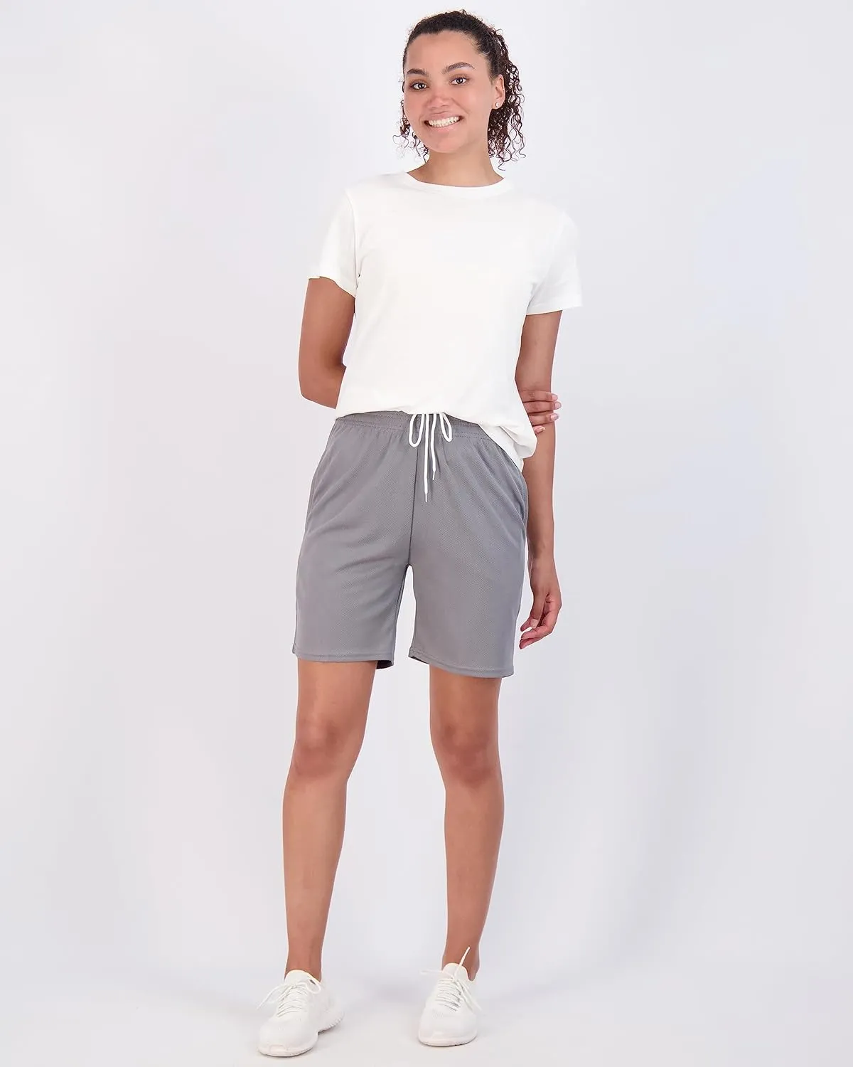 Real Essentials 4-Pack: Women's 7" Mesh Quick-Dry Bermuda Active Athletic Long Shorts with Pockets (Available in Plus Size)