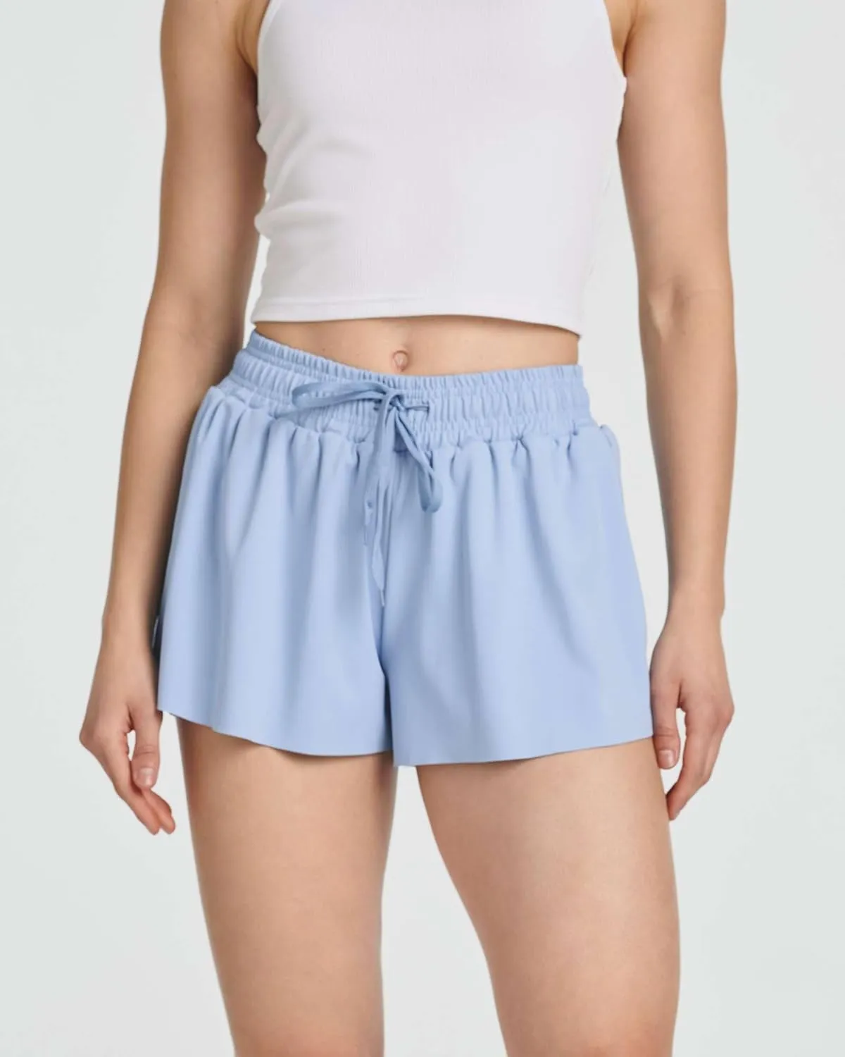 Real Essentials 4 Pack: Womens Flowy Dry Fit Running Short - Gym Yoga Workout Summer Shorts (Available in Plus Size)